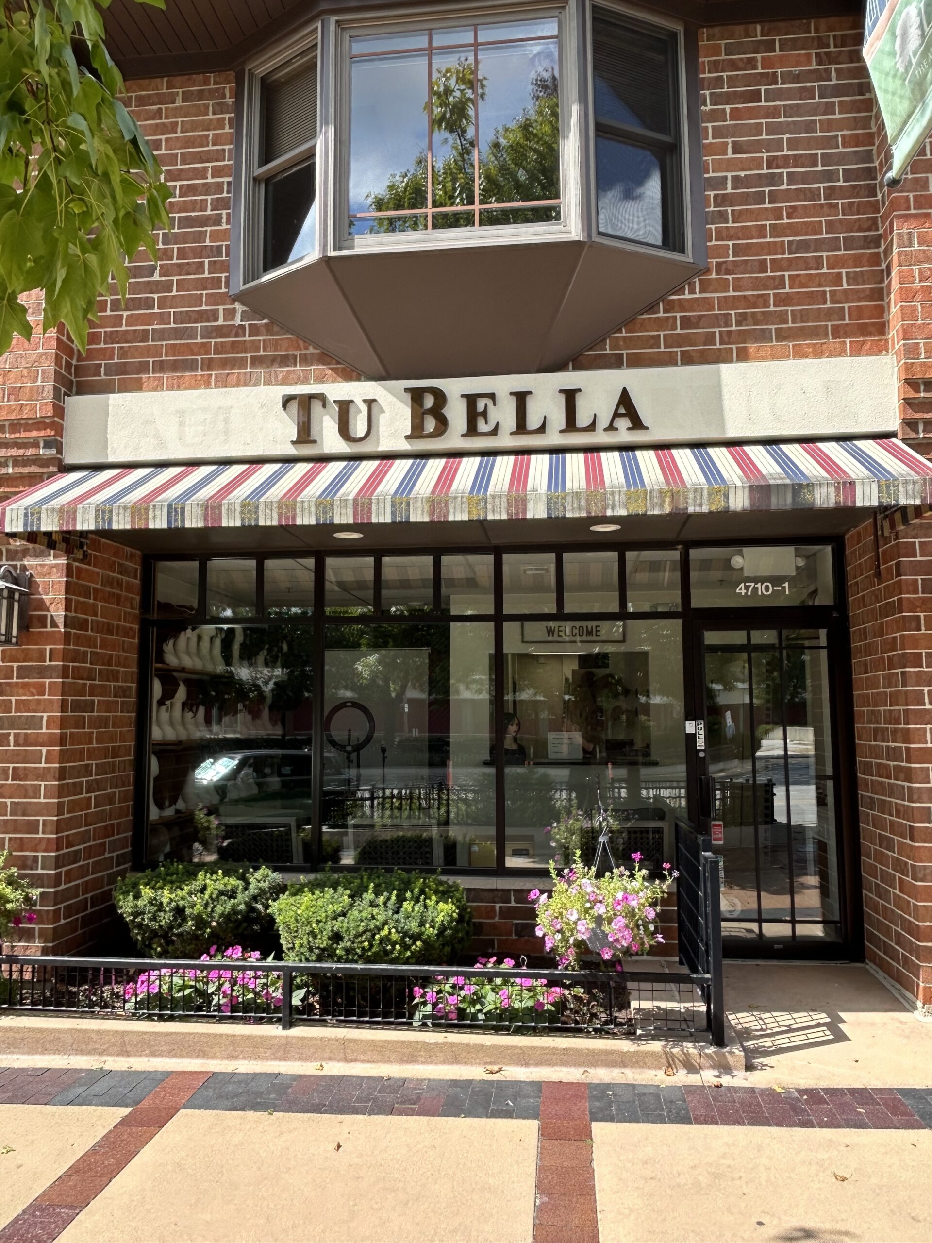 View of the TuBella Hair Studio storefront in Illinois.